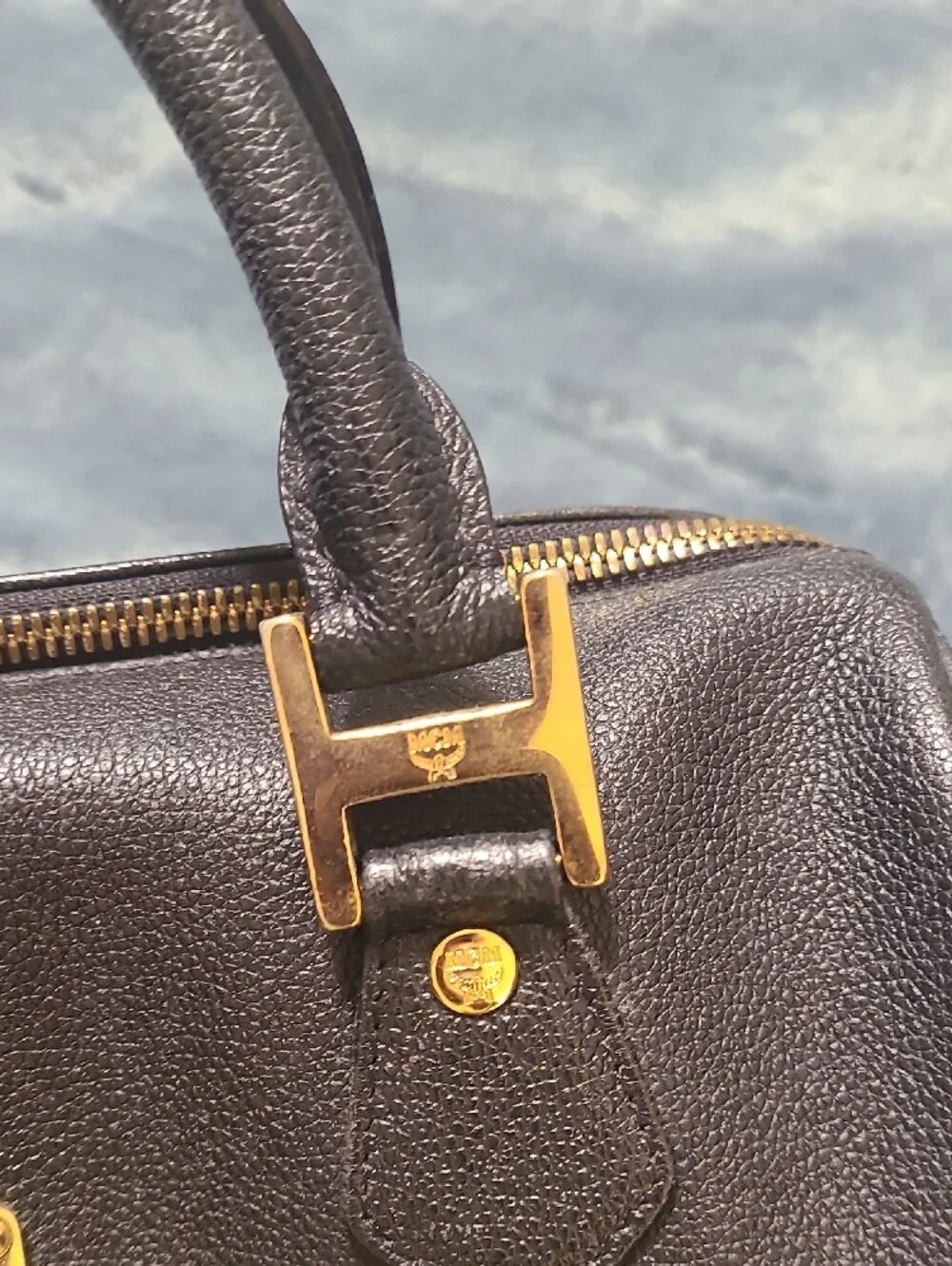 MCM Black Leather Bag with Gold Logo Plate